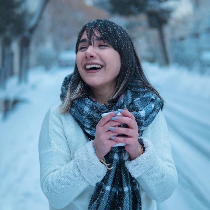 Kaveri Mehta, Lead Design Curator at ShoreVectorStudio, reviewing corporate floral arrangements